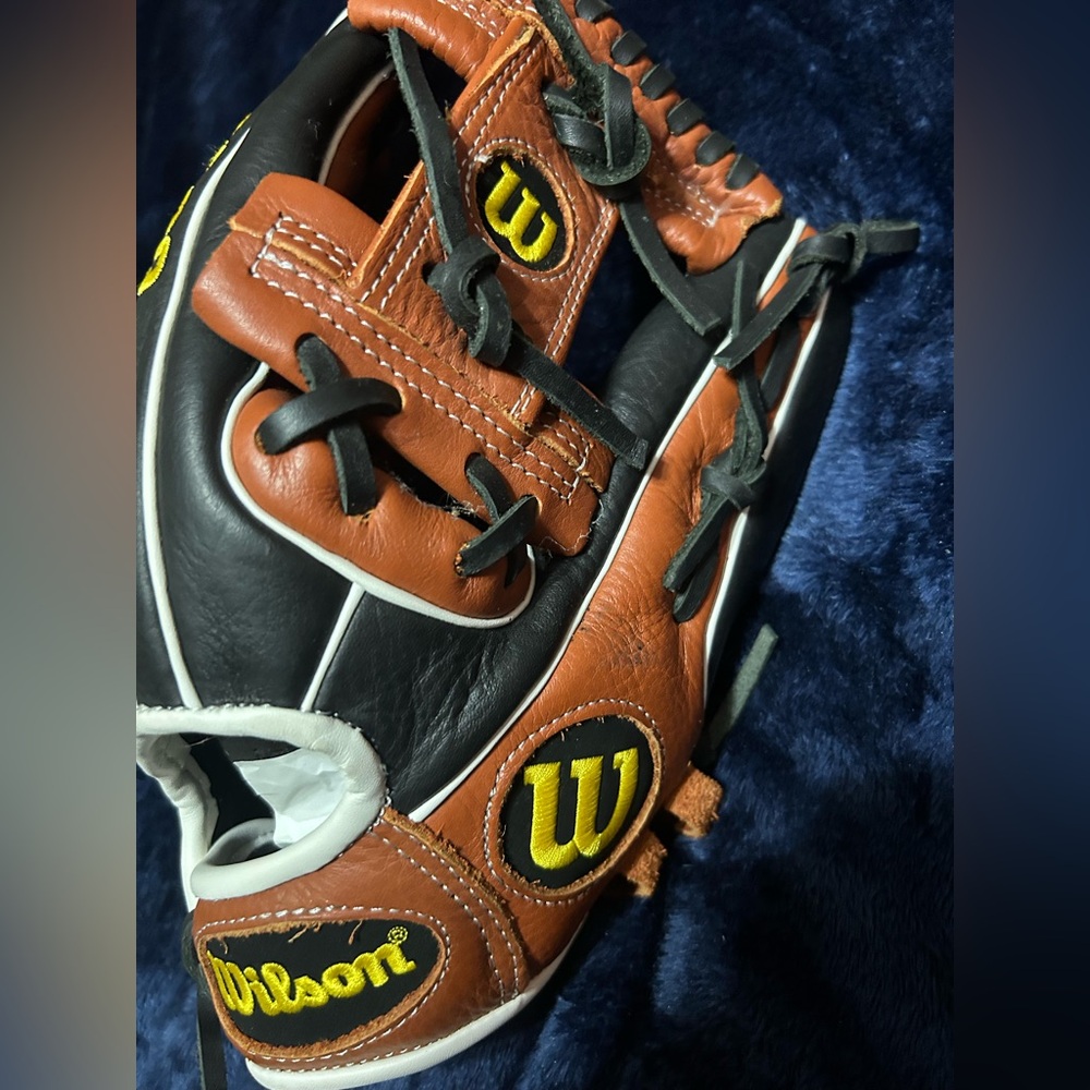 Wilson A-500, leather, right hand throw, ages 7-10.